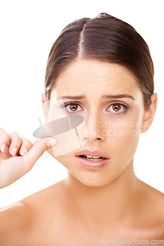 Image of Skin care, pinch and portrait of woman with problem, stress or cheek inspection on white background. Aging, anxiety or model face with beauty crisis, acne or dermatology, pimple and allergic reaction