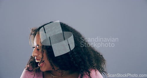 Image of Face, makeup or happy woman laughing at joke or crazy comedy in studio isolated on gray background. Freedom, funny lady or silly female person with pride, goofy smile or joy to relax alone with humor