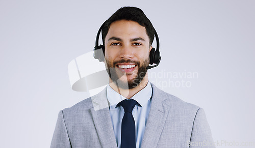 Image of Business man, call center and portrait for communication, customer support and e commerce service in studio. Face of consultant or agent with headphones for contact us isolated on a white background