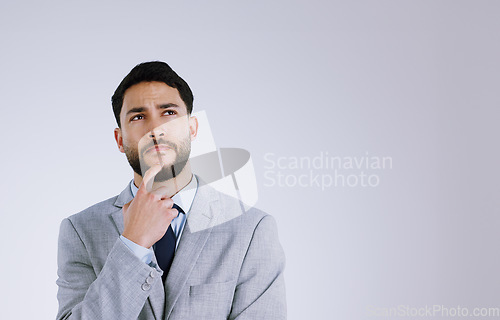 Image of Businessman, face and thinking on mockup for idea, solution or planning against a gray studio background. Male person in wonder, thought or contemplating for memory, remember or reminder and plan
