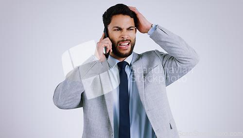 Image of Businessman, smartphone and phone call with stress, frustrated and isolated on studio background. Mobile, professional and overwhelmed with business crisis, corporate accountant and financial mistake