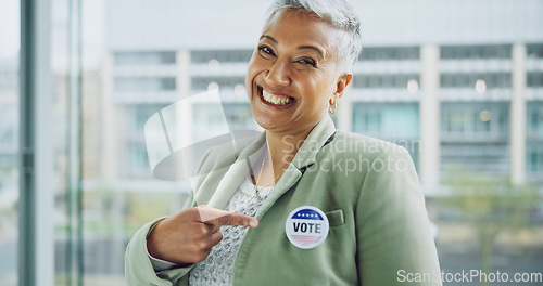 Image of Woman, vote and portrait for politics, pointing and badge for support, government and member. Elections, voter choice and representative for democracy, registration and sticker for voting register