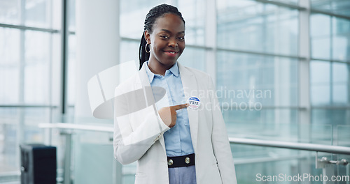 Image of Woman, portrait and badge for vote, smile and confidence or button, proud and choice in politics. Black person, happy and support for elections, democracy and party in registration for human rights