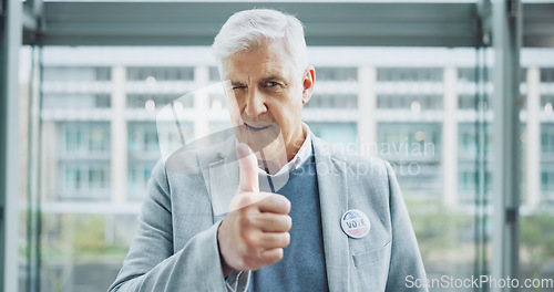 Image of Senior man, thumbs up and politician for vote, thank you and feedback on choice, decision and politics. Mature person, wink and support in review, agreement and motivation to register for election