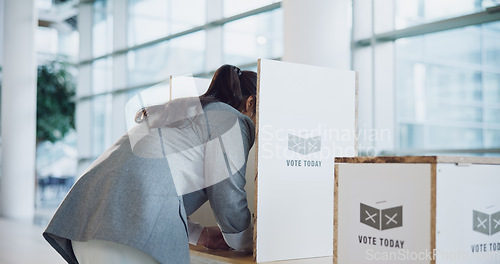 Image of Vote booth, election and woman at station for politics, freedom in democracy or human rights. Polling, back and person at ballot for choice, equality or decision of government, party or state patriot