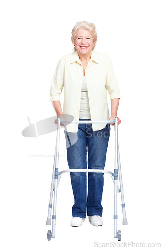 Image of Appreciating the assistance her walker affords. Full-length of a smiling senior woman using a zimmer frame while isolated on white.