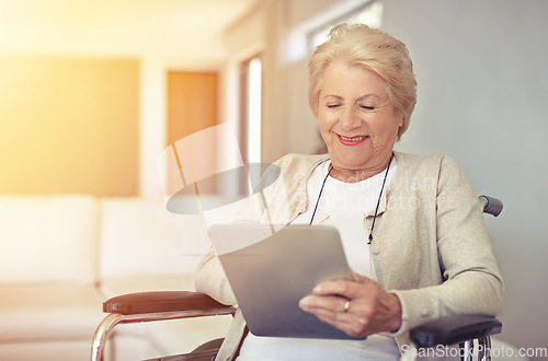 Image of Happy, wheelchair and senior woman with a tablet, connection and typing with communication. Health, mature female person and elderly lady with recover, rehabilitation and technology for social media