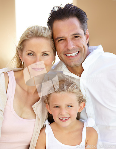 Image of Family comes first. Two delighted parents spending time with their adorable daughter.