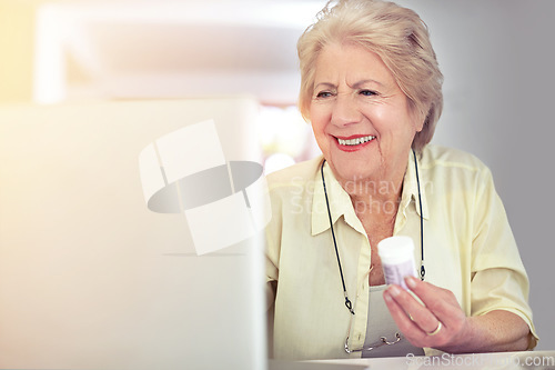 Image of Checking her prescription details online. a senior woman researching her medication online.