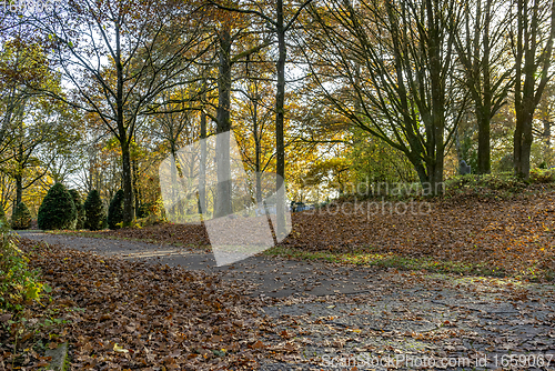 Image of idyllic cemetery at autumn time