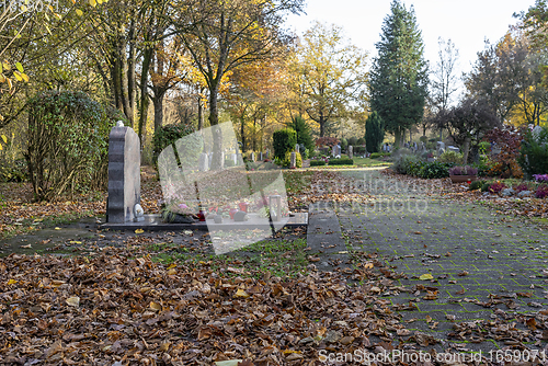 Image of idyllic cemetery at autumn time