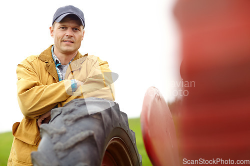 Image of Ive been on this farm my whole life. Portrait of a farmer standing outside beside blurred copyspace.