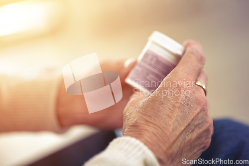 Image of Healthcare, medication and hands with bottle of pills for recover, health and wellness. Medical, medicine and closeup of senior woman with container with prescription tablets, supplements or vitamins