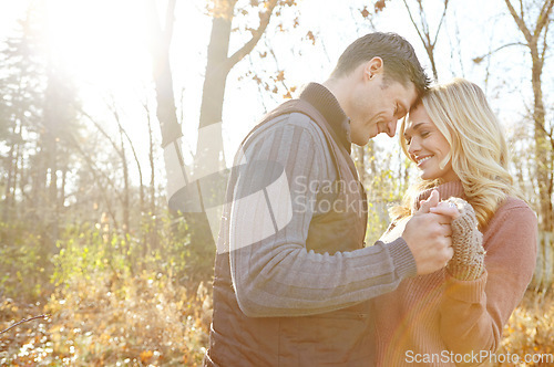 Image of Hes the one. An affectionate and romantic young couple spending time together in the woods.