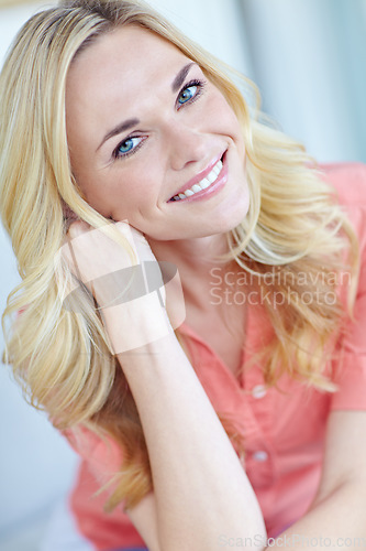 Image of Fresh and real beauty. Portrait of a beautiful young woman smiling and feeling cheerful at home.