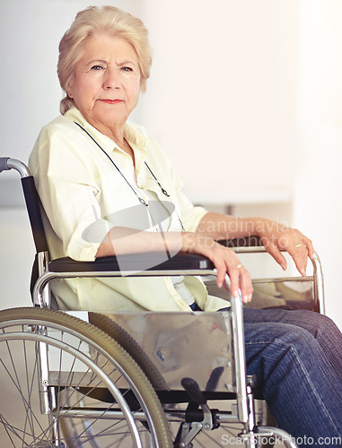 Image of Aging is not a walk in the park. Portrait of a senior woman in her wheelchair at home.