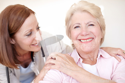Image of A strong bond between doctor and patient - Senior Care. Closeup portrait of a mature nurse and her elderly patient sharing an affectionate moment together.