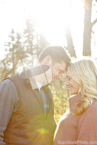 Image of He values her so much. A happy and loving couple spending time out in the woods together.