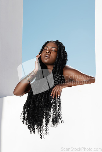 Image of Look at those locks. an attractive young woman posing outside.