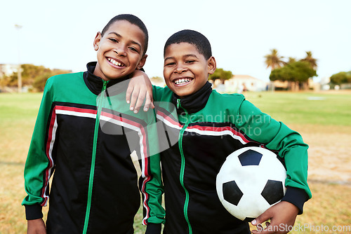 Image of When you need a friend, you can always count on your teammates. Portrait of two young boys playing soccer on a sports field.