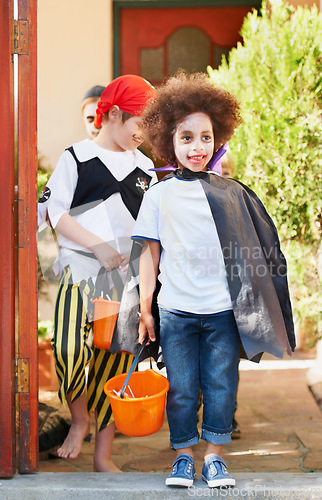 Image of He loves dressing up so much. children dressed up for halloween.