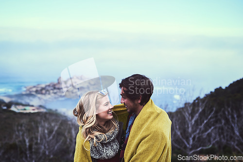 Image of Youre the most beautiful view out here. an affectionate young couple enjoying a hike in the mountains.
