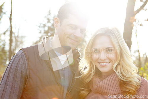 Image of Fall is their favorite season. A happy and loving couple spending time out in the woods together.