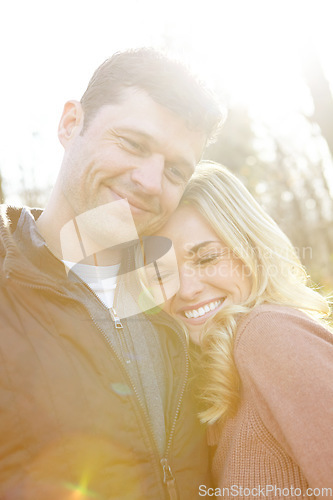 Image of Living a life filled with love. A happy and loving couple spending time out in the woods together.