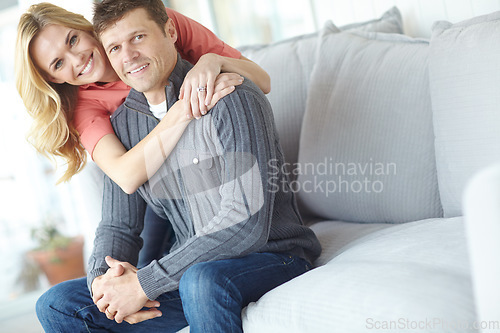 Image of Theyre such a loving couple. Portrait of an affectionate and happy mature couple spending time together while relaxing at home.