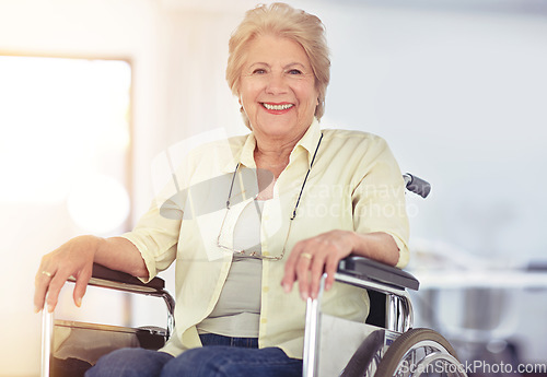 Image of Nothing gets her down. Portrait of a senior woman in her wheelchair at home.