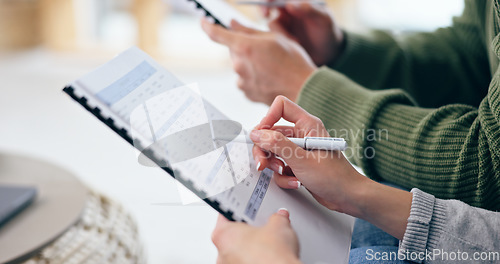 Image of Closeup, couple and hand with clipboard for financial planning, budget or savings in home. Woman, pen or paperwork for checking by spouse for calculation of money for future, investment or growth