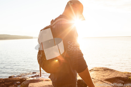 Image of Got a problem to solve Go for a hike. a man wearing his backpack while out for a hike on a coastal trail.