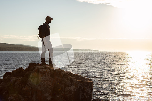 Image of Every hike seems even better than the previous one. a man wearing his backpack while out for a hike on a coastal trail.