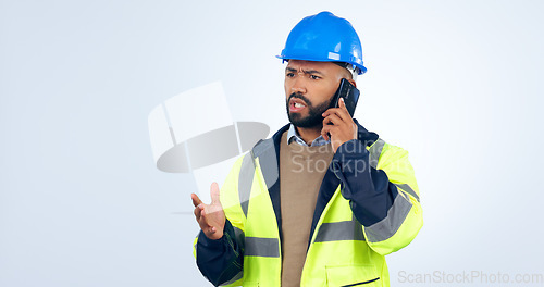 Image of Frustrated man, architect and phone call for construction or discussion against a studio white background. Serious male person, contractor or engineer talking on mobile smartphone in conversation