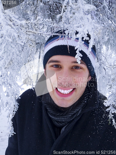 Image of Smiling man in winter park