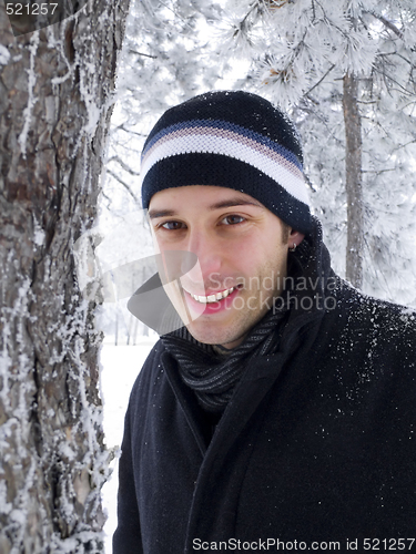 Image of Smiling man in winter park