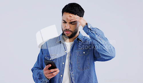 Image of Man, smartphone and frustrated with doubt for notification, online news and studio background. Arab, male or hands with question on face, shocked expression or reading gossip on cellphone in surprise