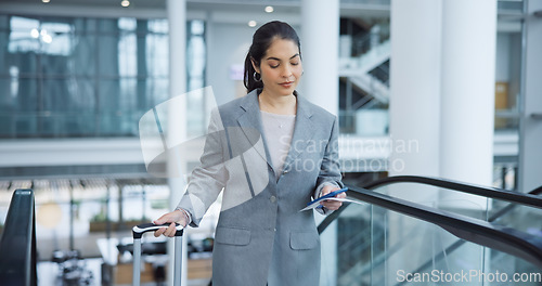 Image of Business, escalator and travel with woman, smartphone and social media with accountant, suitcase and ticket. Person, employee and broker with a cellphone, airport or convention with connection or app