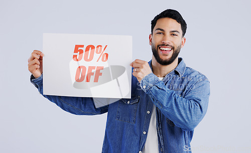 Image of Man, poster and excited with sale in portrait, shopping discount and retail announcement by studio mockup. Young person, paper and board for sales promotion with news launch by white background