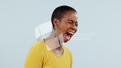 Image of Stress, anxiety and angry black woman screaming in studio with broken heart, grief or fear on grey background. Psychology, depression and African female model shouting with trauma, conflict or crisis