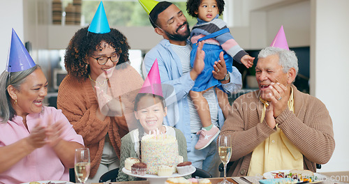 Image of Birthday cake, kids and family with grandparents for celebration, party and singing or clapping with love. Happy interracial mother, father and girl for congratulations or holiday dessert at home