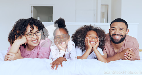Image of Family in portrait with kids on bed, morning bonding together for love and memory in home. Bedroom, happy parents face and mom, dad and children in apartment with smile, relax with mother and father.
