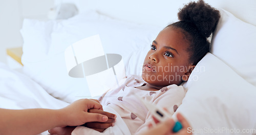 Image of Sick, kids or a girl with a fever in bed to relax or recover and a parent in the home to care or check. Black family, children and an unhealthy daughter in the bedroom of an apartment with an illness