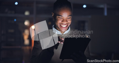 Image of Businessman, night and tablet with smile in office, reading search with career progress in company. Black man, happy or touchscreen for email on project growth, web or feedback on startup expansion