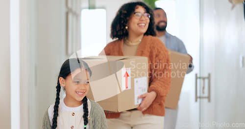 Image of Happy family with boxes, moving and new home with property mortgage, future opportunity and security. Mother, father and child together in apartment, real estate investment and cardboard box in house