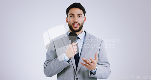 Image of Portrait, man and reporter for news with microphone on white background for mock up with broadcast in studio. Person, journalist and talking for announcement, information or live stream in Mexico