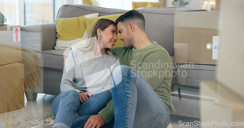 Image of Happy couple, boxes and new home at sofa for dream house, living room or property. Man, woman and forehead embrace at couch for achievement smile or apartment change for milestone, talking or relax