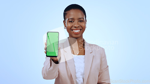 Image of Happy black woman, portrait or phone green screen mockup for social media advertising. Blue background, review or business person with chroma key on mobile app display for marketing space in studio