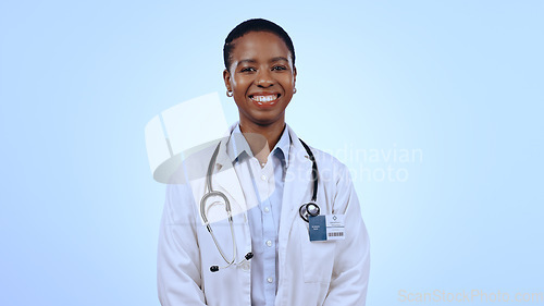 Image of Portrait, happy woman and doctor with smile in studio for healthcare mockup on blue background in Cape Town. Black person, medical professional and excitement for career, choice and medicine for care