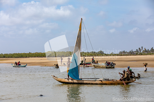 Image of A fisherman sails back from the sea Morondava, Madagascar